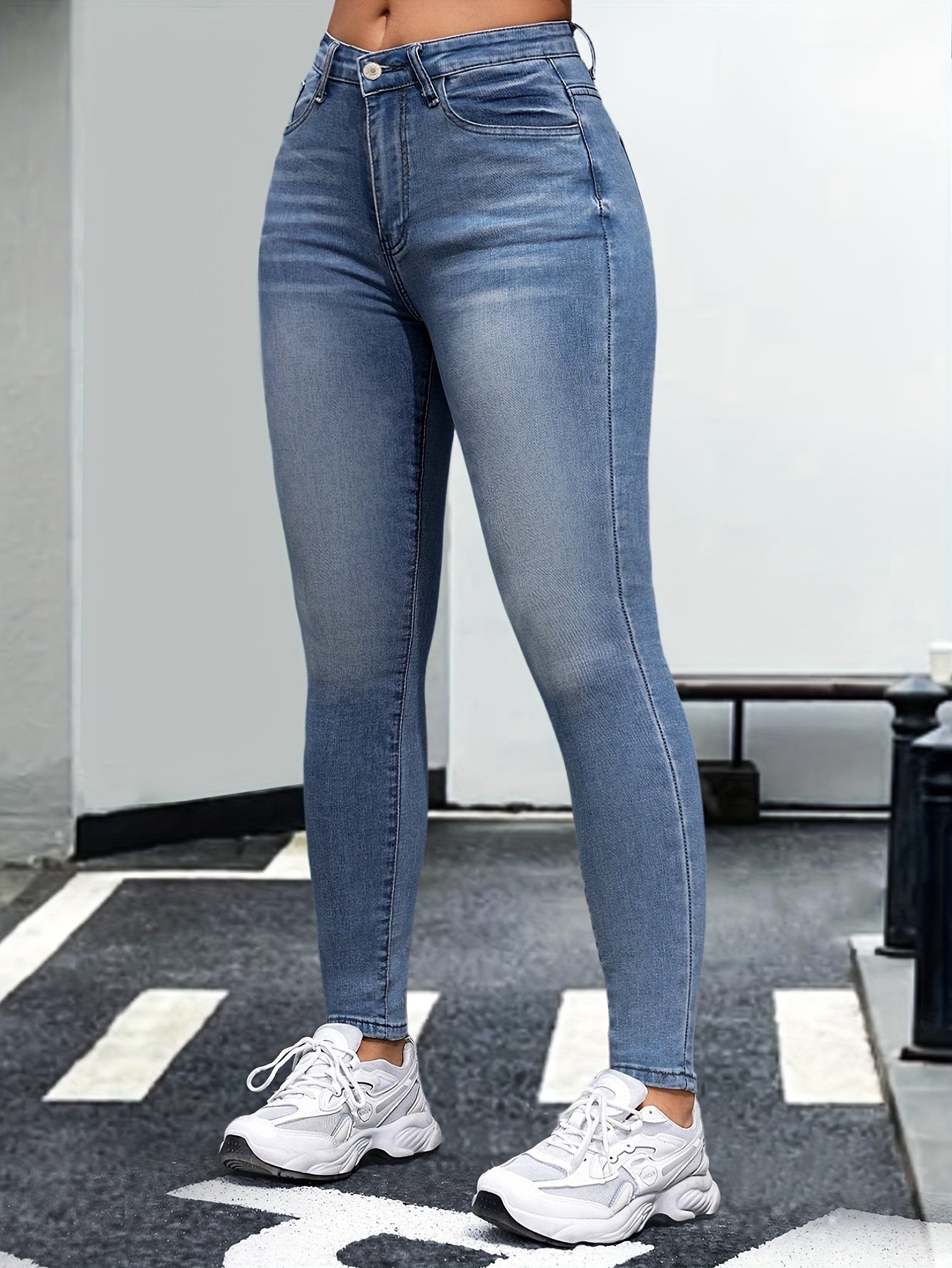 Jeans ajustados de mezclilla